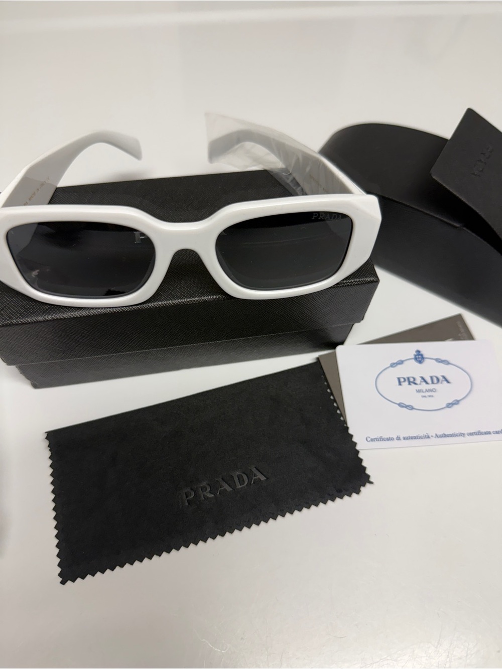 Prada White Rectangular Sunglasses with gray Lenses